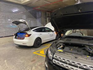 Checking a car's condition during a pre-purchase inspection in Brisbane